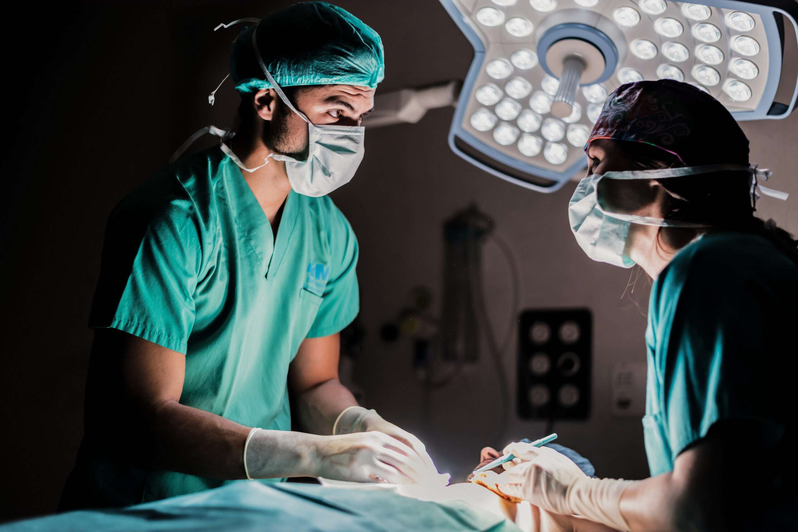 Specialist surgeon performing dental procedure